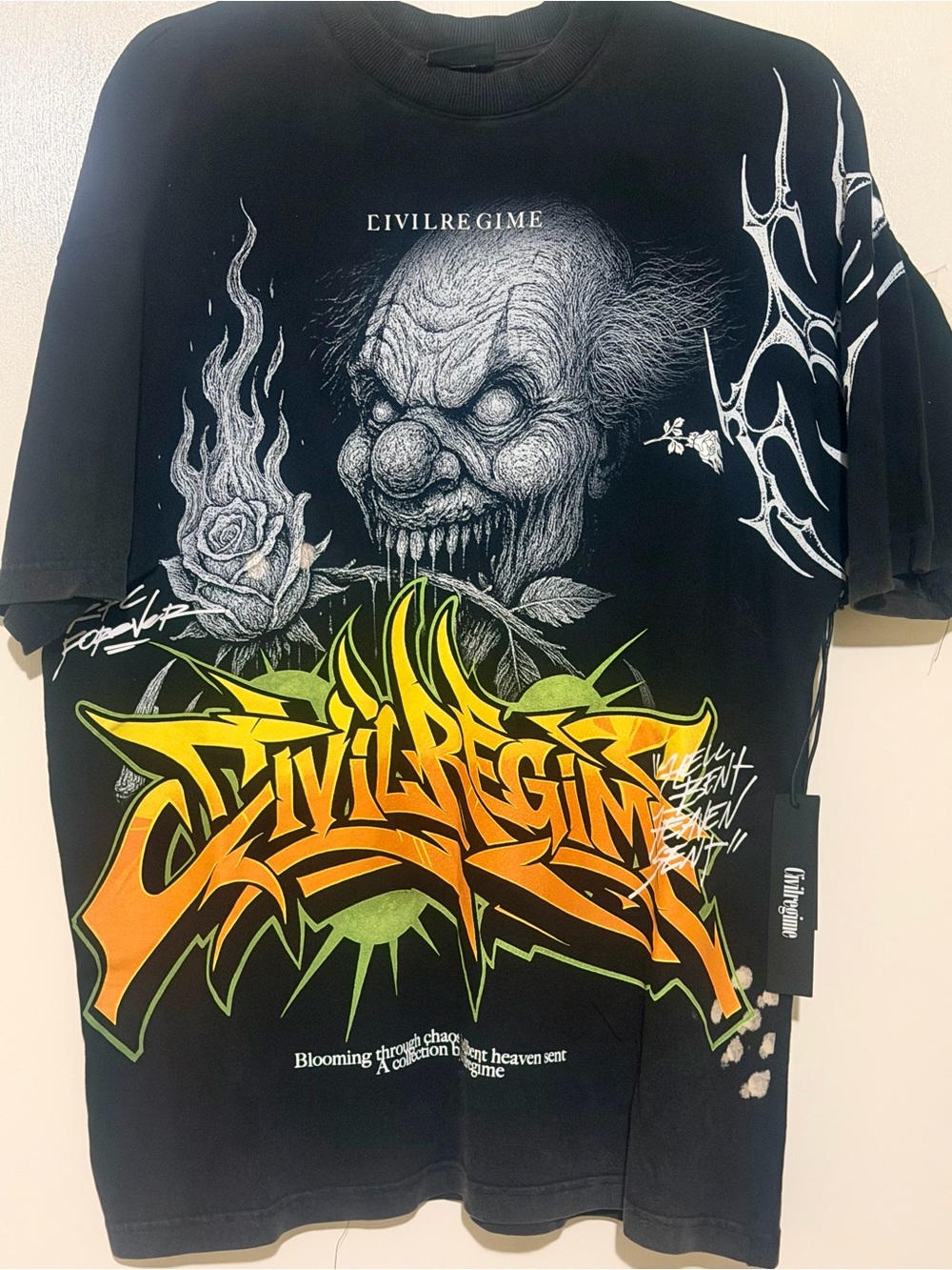 Civil Regime Tee with Clown Graphic and Graffiti Style Logo